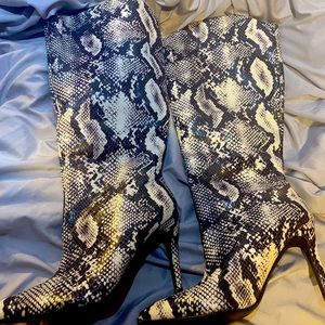 Caterina snake heeled boot